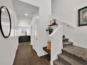 Entry way with stair and shoe nook