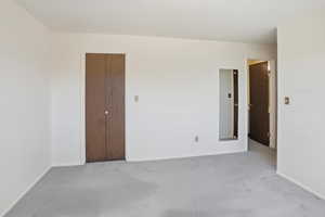 Large primary bedroom with 3 closets