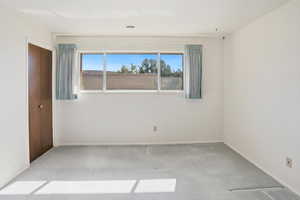 Large primary bedroom with 3 closets