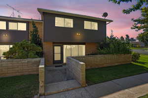 Front entrance to home with large patio area