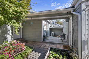 View of patio featuring a wooden deck