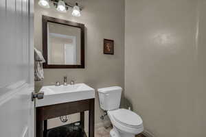 Bathroom featuring toilet and vanity