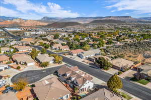 Aerial perspective of suburban area with mountains