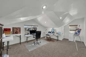 Carpeted office space with recessed lighting, lofted ceiling, and a textured ceiling