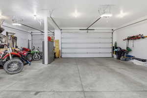 Garage featuring a garage door opener