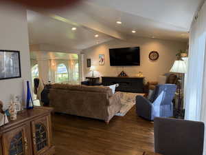 Living room featuring dark wood  floors and recessed lighting