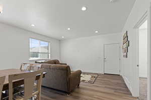 Living room featuring recessed lighting and wood finished floors