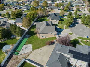 Aerial overview of property's location featuring nearby suburban area