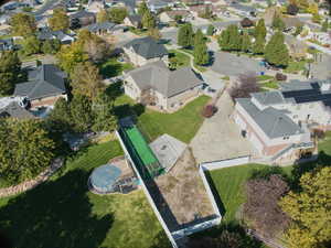 Aerial overview of property's location featuring nearby suburban area