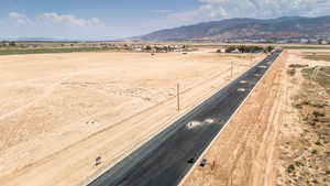 Aerial view of sparsely populated area with a mountain backdrop