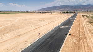 View of mountain background featuring rural landscape