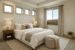 Bedroom featuring light carpet