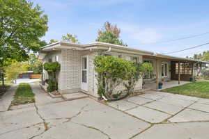 View of front of house featuring brick siding