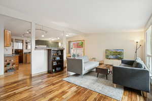 Living room with light wood-style floors