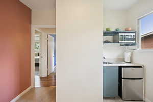 Interior space featuring carpet and a sink