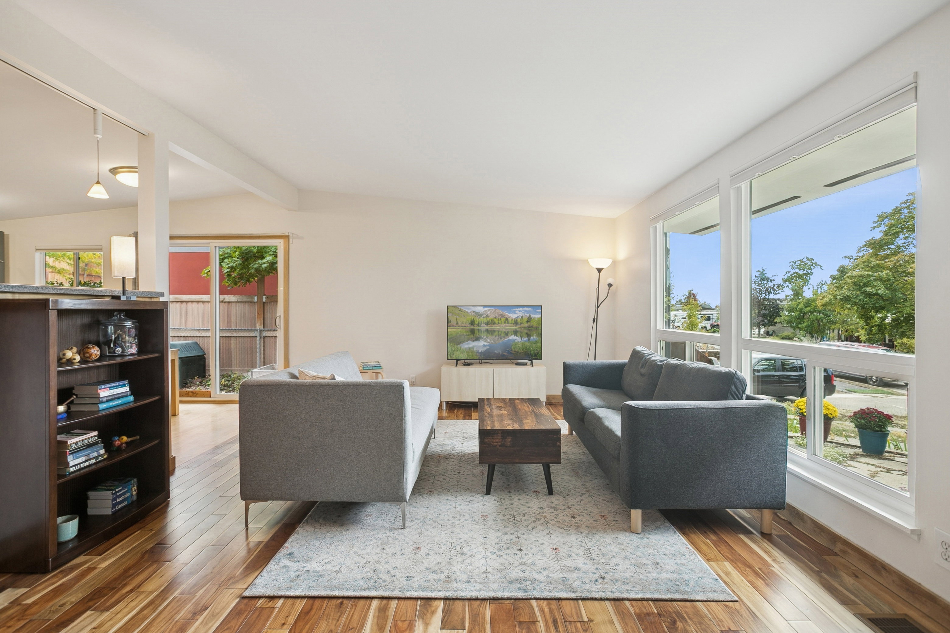Living room with light wood-style floors