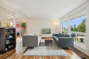 Living room with light wood-style floors