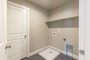 Laundry room featuring hookup for a washing machine and electric dryer hookup