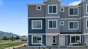 View of front of home with a mountain view