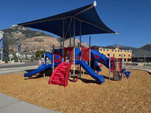 Community jungle gym with a mountain view