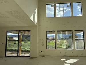 Interior space featuring a towering ceiling