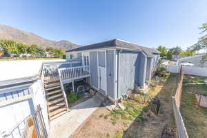 View of outdoor structure featuring stairway