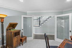 Office area featuring ornamental molding, carpet, and recessed lighting