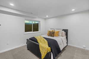 Bedroom featuring carpet flooring and recessed lighting