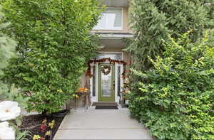 Property entrance with stucco siding