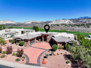 View of subject property with mountains