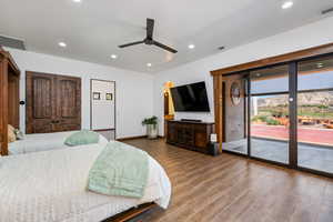 Bedroom with recessed lighting, access to exterior, wood finished floors, and ceiling fan