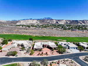 Aerial view of mountains and a golf club