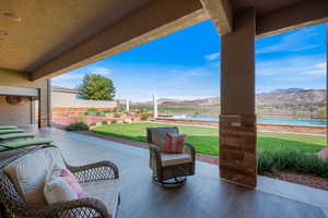 View of patio / terrace with a mountain view