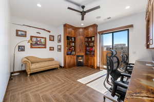 Office area with ceiling fan, wine cooler, and recessed lighting