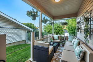 Deck with an outdoor hangout area