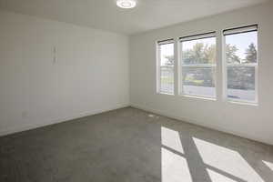 Empty room featuring carpet