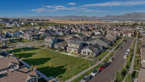 Aerial perspective of suburban area with a mountain backdrop