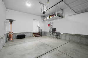 Garage featuring a garage door opener