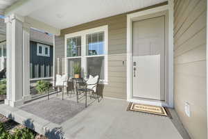 Property entrance with a porch