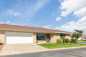 Ranch-style home featuring brick siding, concrete driveway, a front yard, and a garage