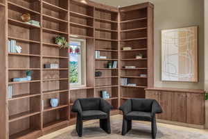 Living area featuring tile patterned flooring