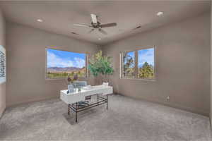 Home office featuring carpet, a ceiling fan, and recessed lighting