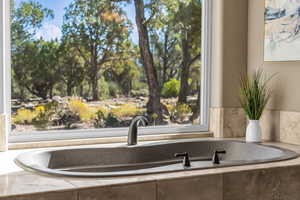 Detailed view of a bath and a sink