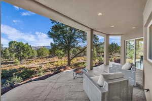 View of patio with a fire pit