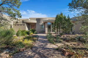 Adobe home with stucco siding