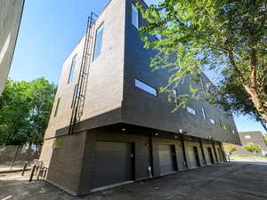 View of property featuring an attached garage