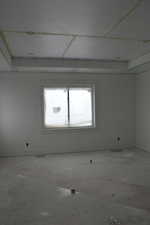 Unfurnished room with baseboards