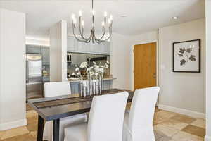 Dining area with doorway to hallway for back stairwell