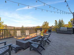View of patio / terrace featuring area for grilling and a mountain view