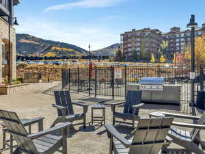 View of patio / terrace with a mountain view and area for grilling